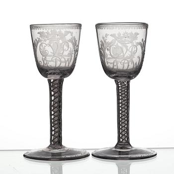 A pair of engraved ale glasses, 18th Century, presumably England.