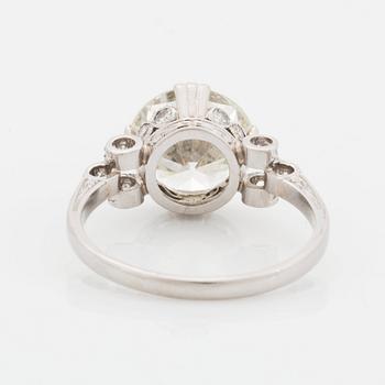 A platinum ring set with an old-cut diamond weight ca 3.00 cts quality ca J/K vs.