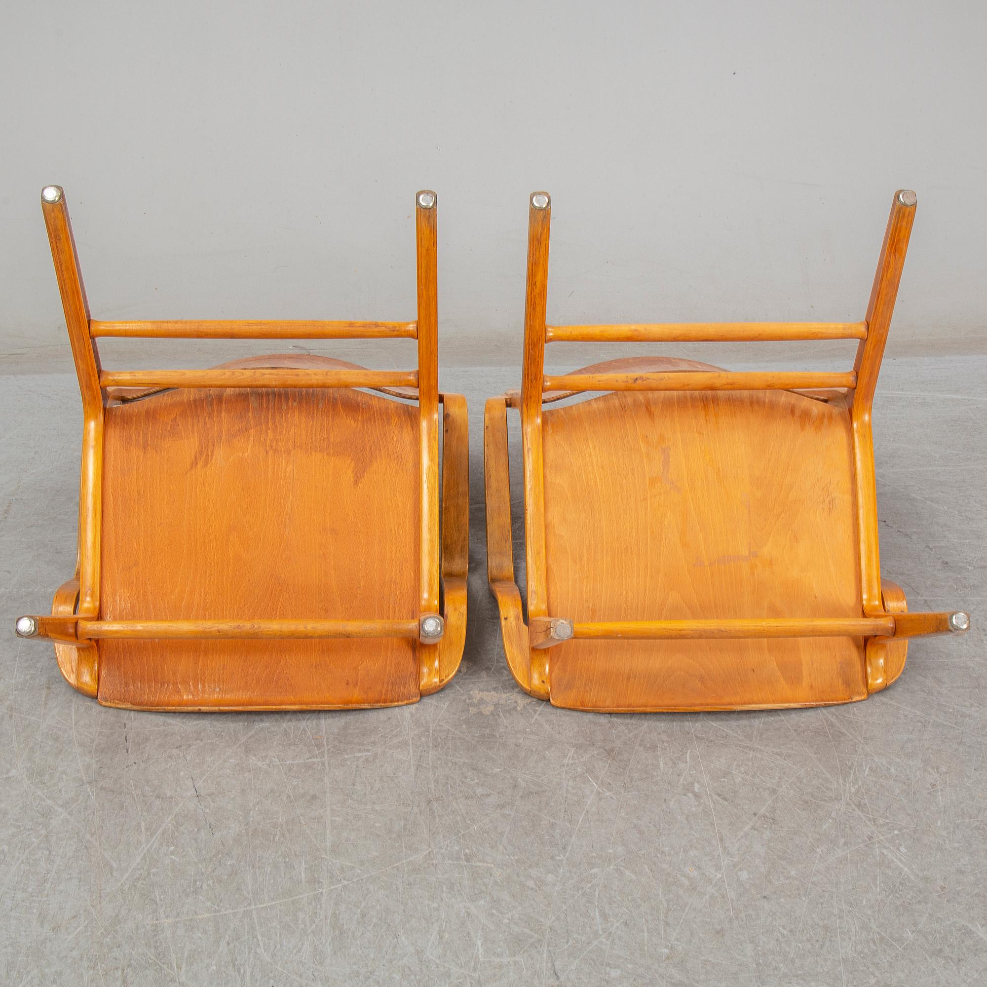 A pair of "Ax-chairs" by PETER HVIDT & ORLA MØLGAARD NIELSEN, Fritz Hansen, Denmark, 1950-60s.