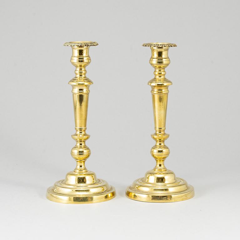 A pair of bronze candlesticks, first half of the 19th century.