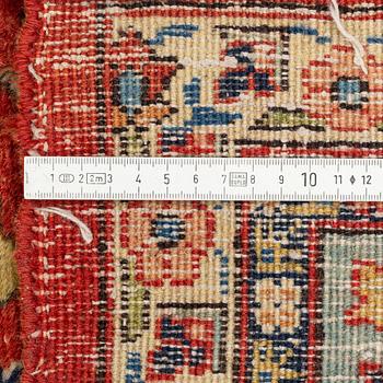 A oriental carpet, ca 320 x 223 cm.