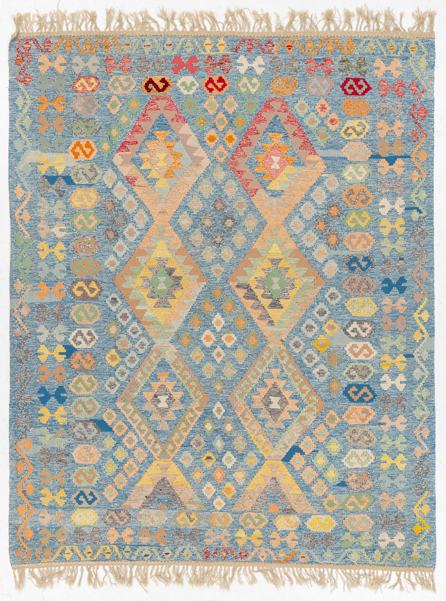 A Kilim rug, c. 255 x 202 cm.