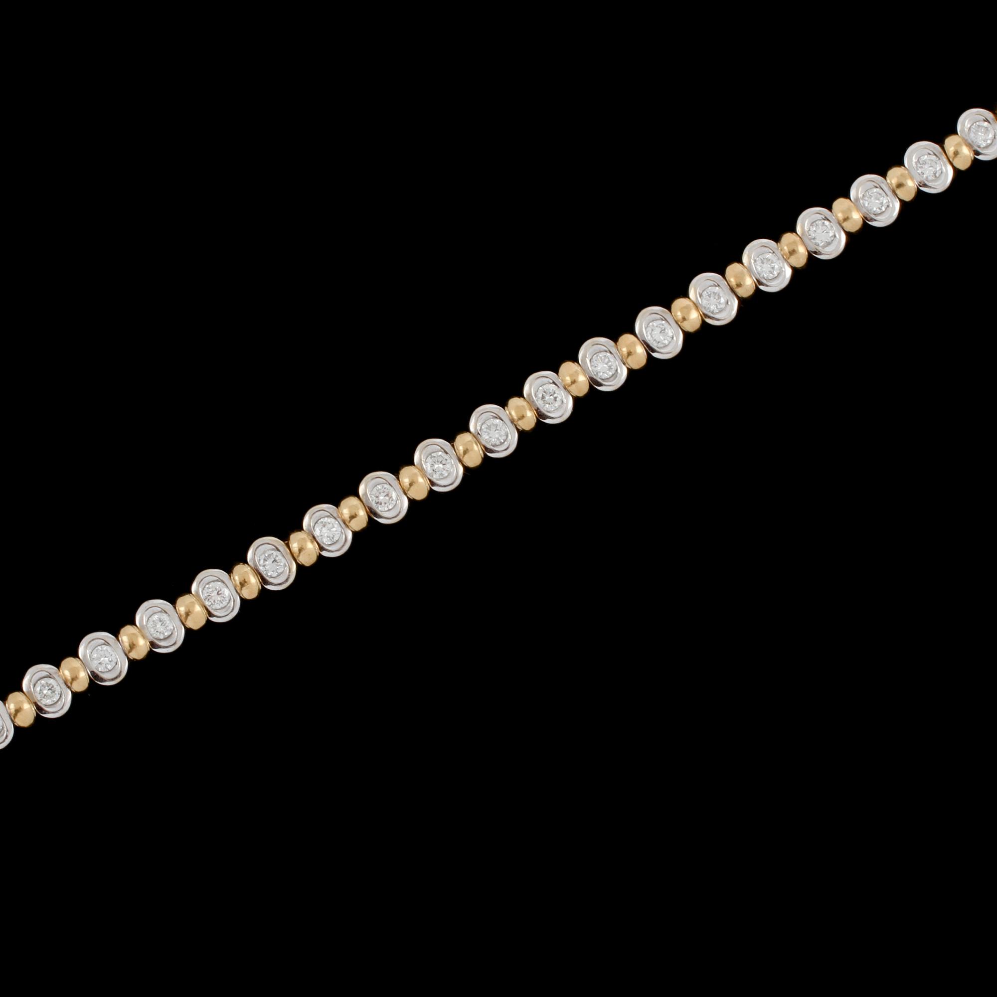 ARMLÄNK, 18k guld och vitguld med 30 briljantslipade diamanter, ca 1.20 ct, Italien, 1900-talets slut.  Vikt 19 g.