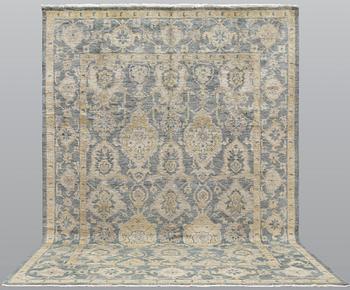 An oriental carpet, ca 425 x 300 cm.