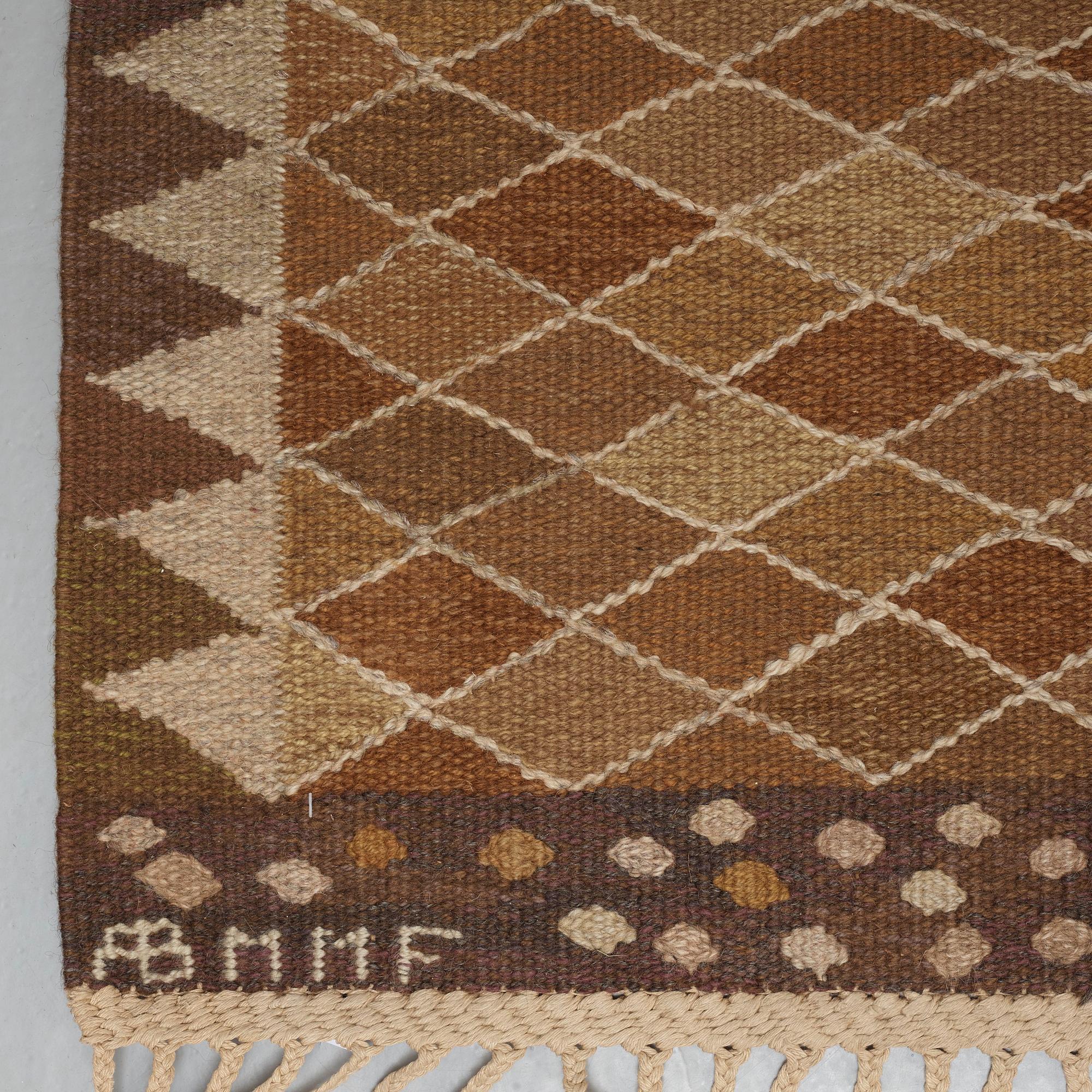 CARPET. "Josefina, brun". Flat weave. 475 x 380,5 cm. Signed AB MMF MR.