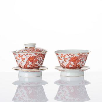 A pair of five clawed dragon bowls on stands and a cover, Qing dynasty, Daoguang mark and period (1821-50).