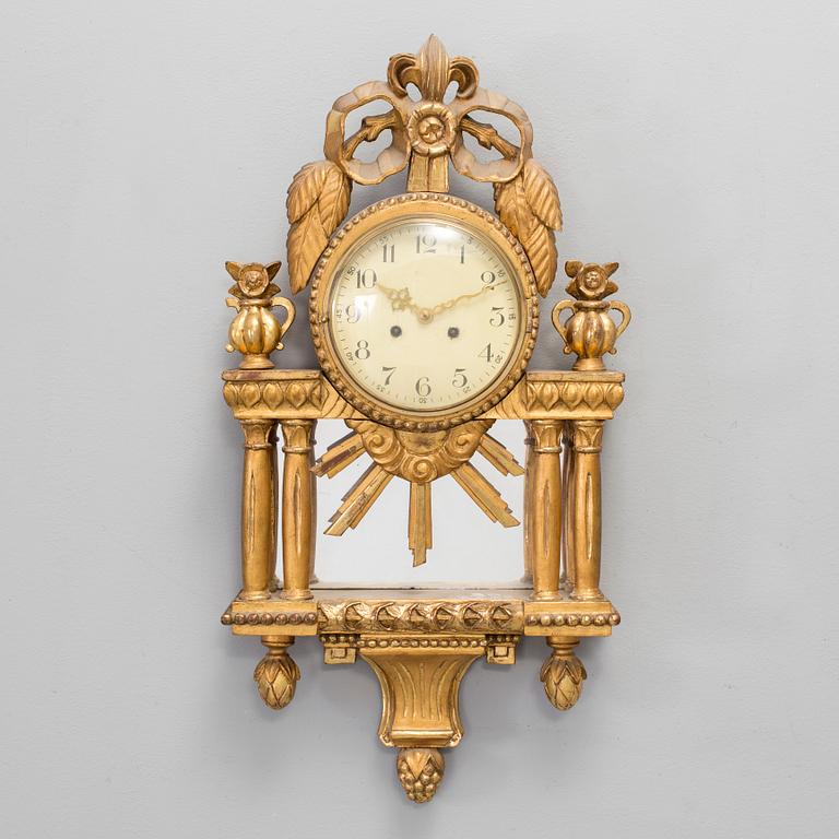 A WALL CLOCK, gustavian style, 20th century.