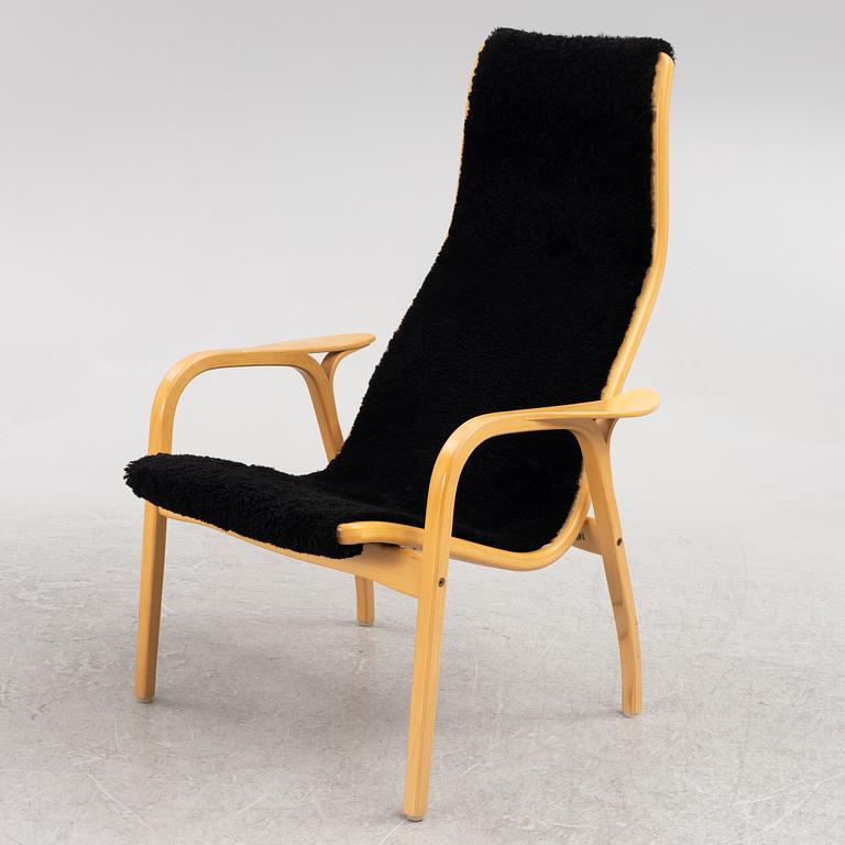 Yngve Ekström, an armchair and a footstool, "Lamino", Swedese, second half of the 20th century.