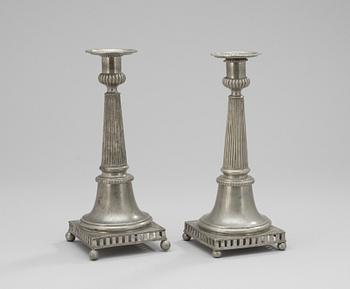 A set of two 18th century pewter candlesticks, makers mark Hans Wiksten, Västerås 1782-1810/14..