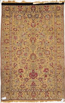 A carpet, an antique silk metal brocaded Kashan, probably around 1910, ca 200-202,5 x 129-131 cm.