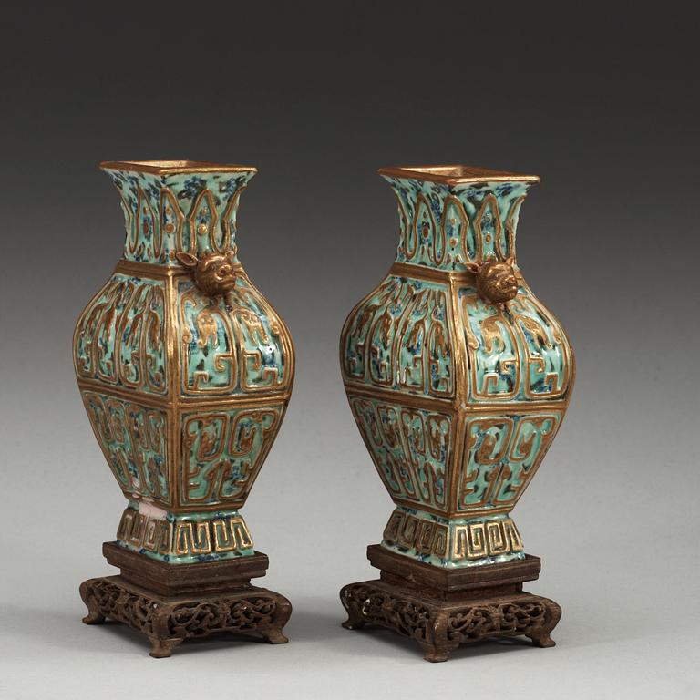 A pair of vases, late Qing dynasty, with Qianlong sealmark.