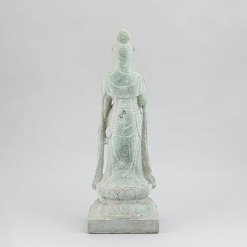 A carved Chinese stone figurine of Guanyin, first half of the 20th century.