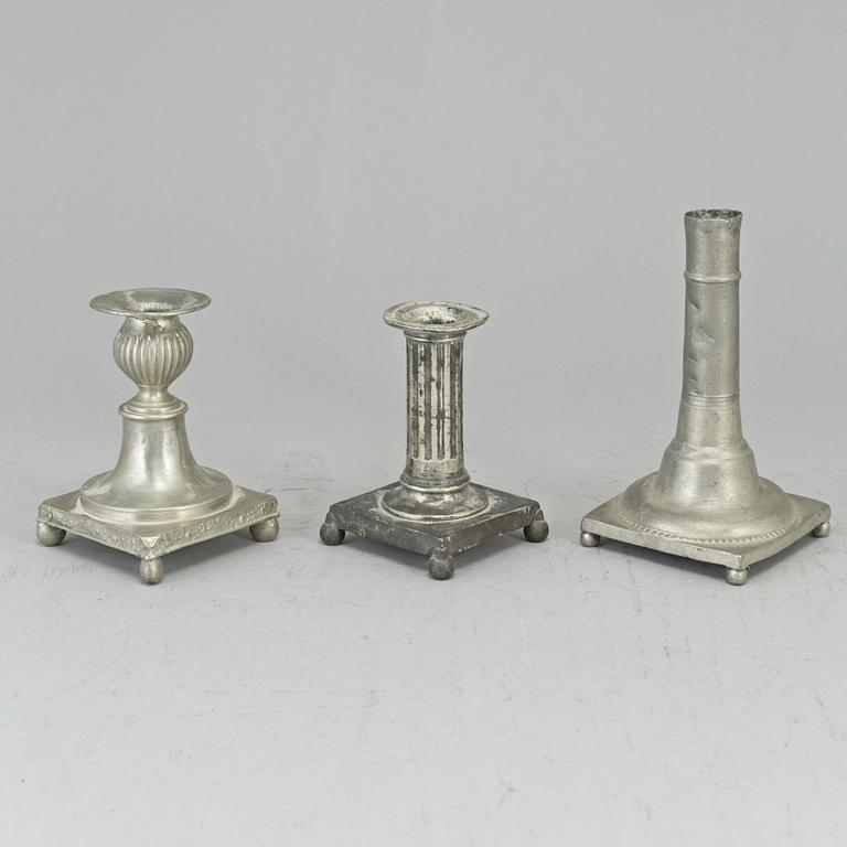 Three 19th century gustavian pewter candlesticks.