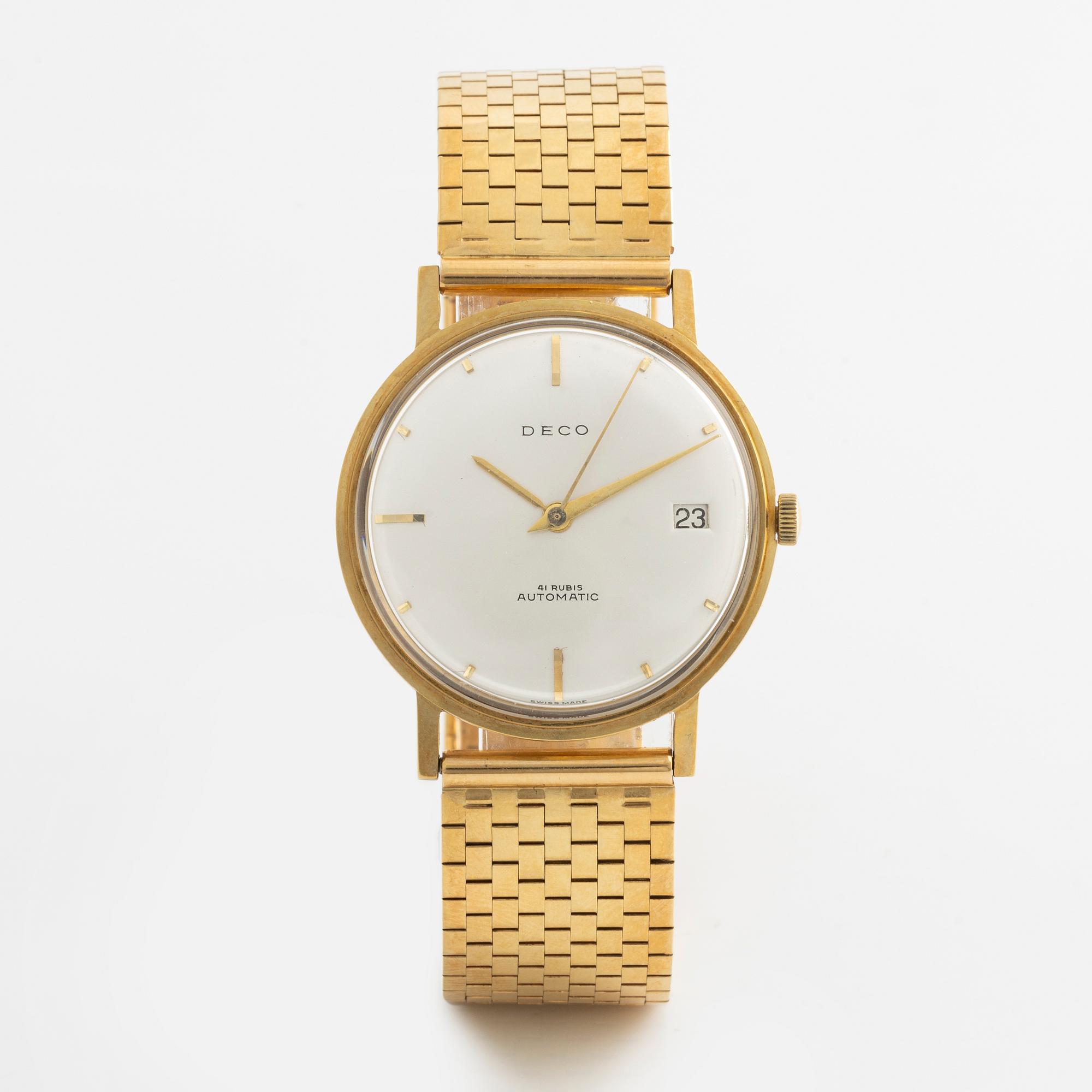 Deco, 18k wristwatch with bracelet in 18K gold, 34 mm.