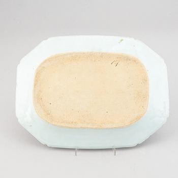 A set of two blue and white serving dishes, and two famille rose dinner plates, Qing dynasty, Qianlong (1736-95).