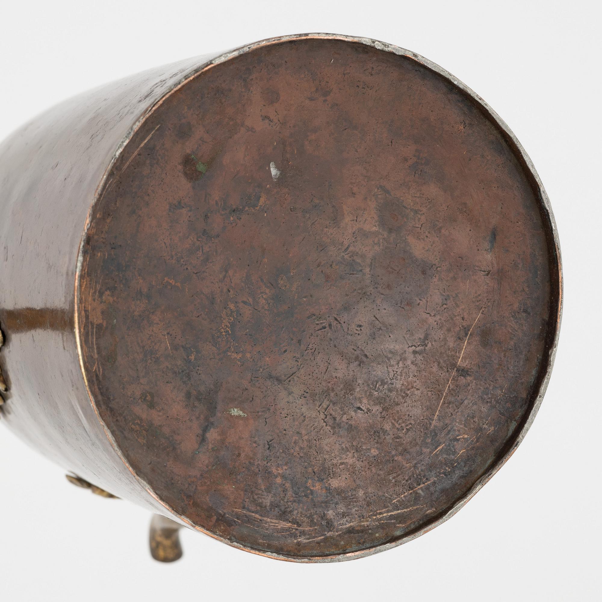 A Swedish copper and brass rococo coffee pot, later part of the 18th century.
