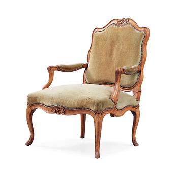 1229. A Louis XV 18th century armchair.