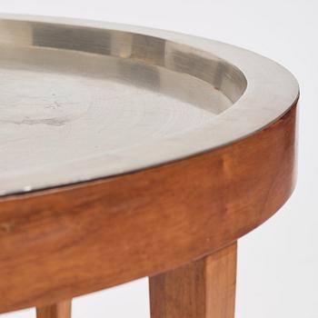 Josef Frank, a pewter top walnut table, model 2110, Svenskt Tenn Sweden, Mid 20th C. The table was designed in 1947.