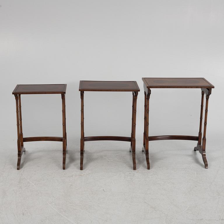 Three-piece nest of tables, mid-20th century.