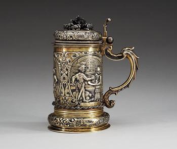 A 17TH CENTURY SILVER-GILT TANKARD, Makers mark of Erhardus Würstemann (1612-1677), Löcse. Depicting the story of Judith and Holofernes.