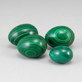 Four 20th century malachite eggs.