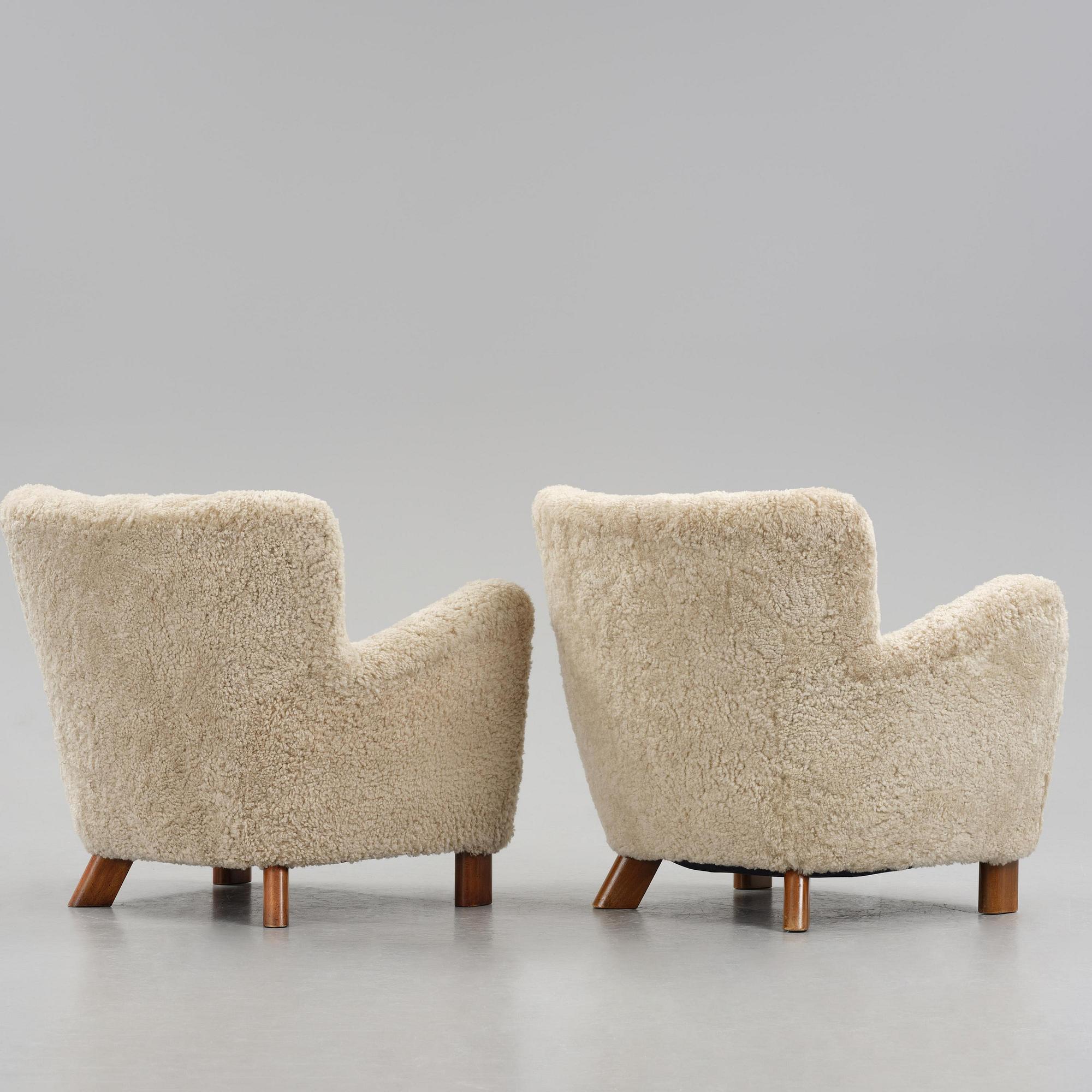 Fritz Hansen, a pair of easy chairs model "1669", Denmark, 1940s.