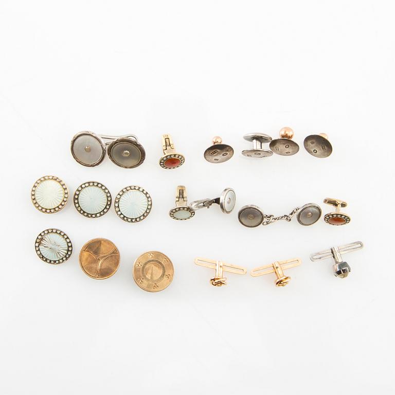 Collection of dress buttons, gold and silver, including those by Axel Georg Björkman, Stockholm 1878.