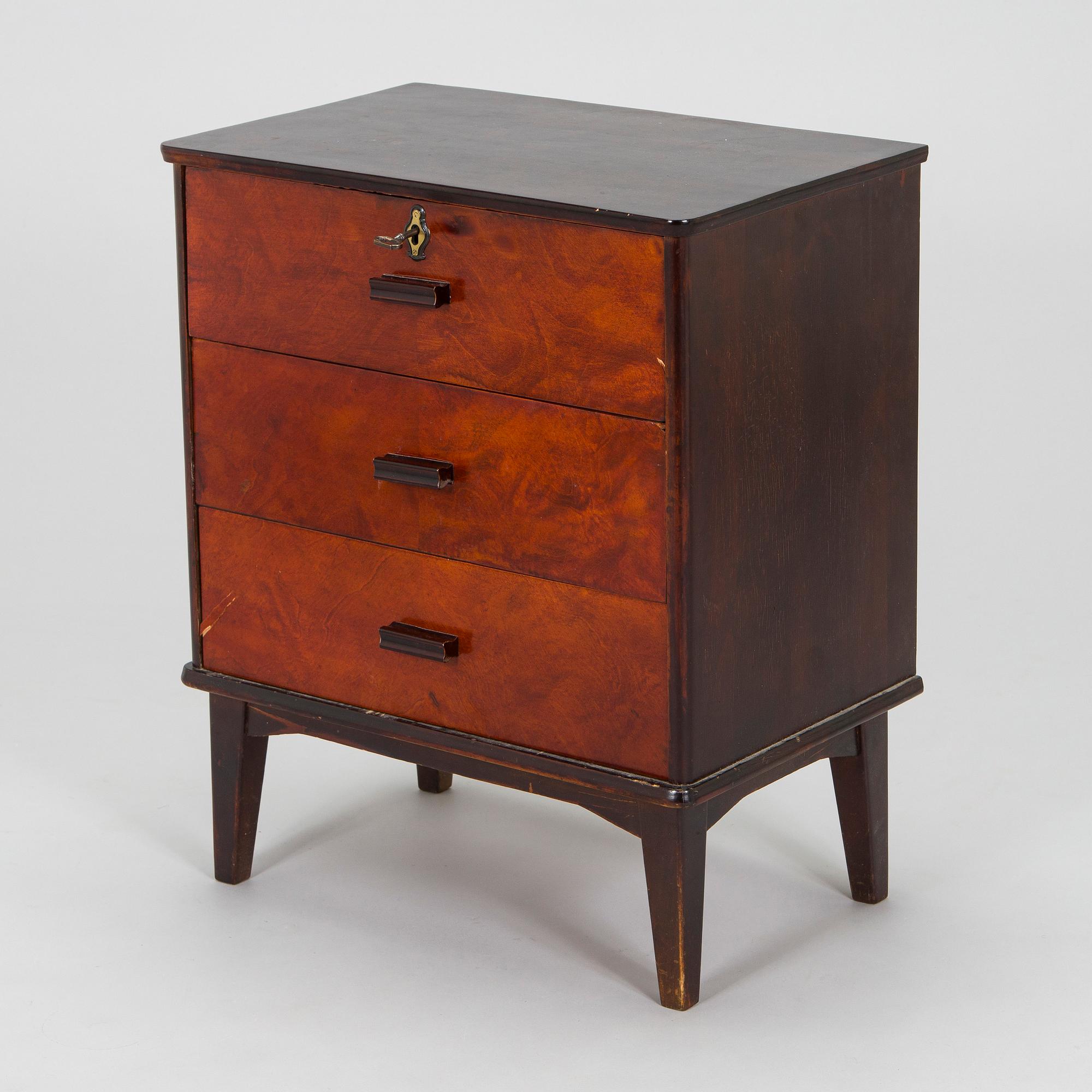 A 1930s functionalist style chest of drawer.