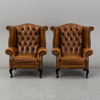 A pair of second half of the 20th century chesterfield model easy chairs.