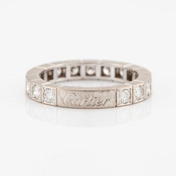 An 18K white gold Cartier ring set with round brilliant-cut diamonds.