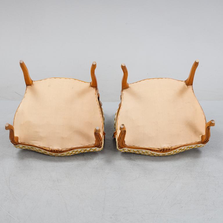 A pair of rococo style armchairs, early 20th Century.