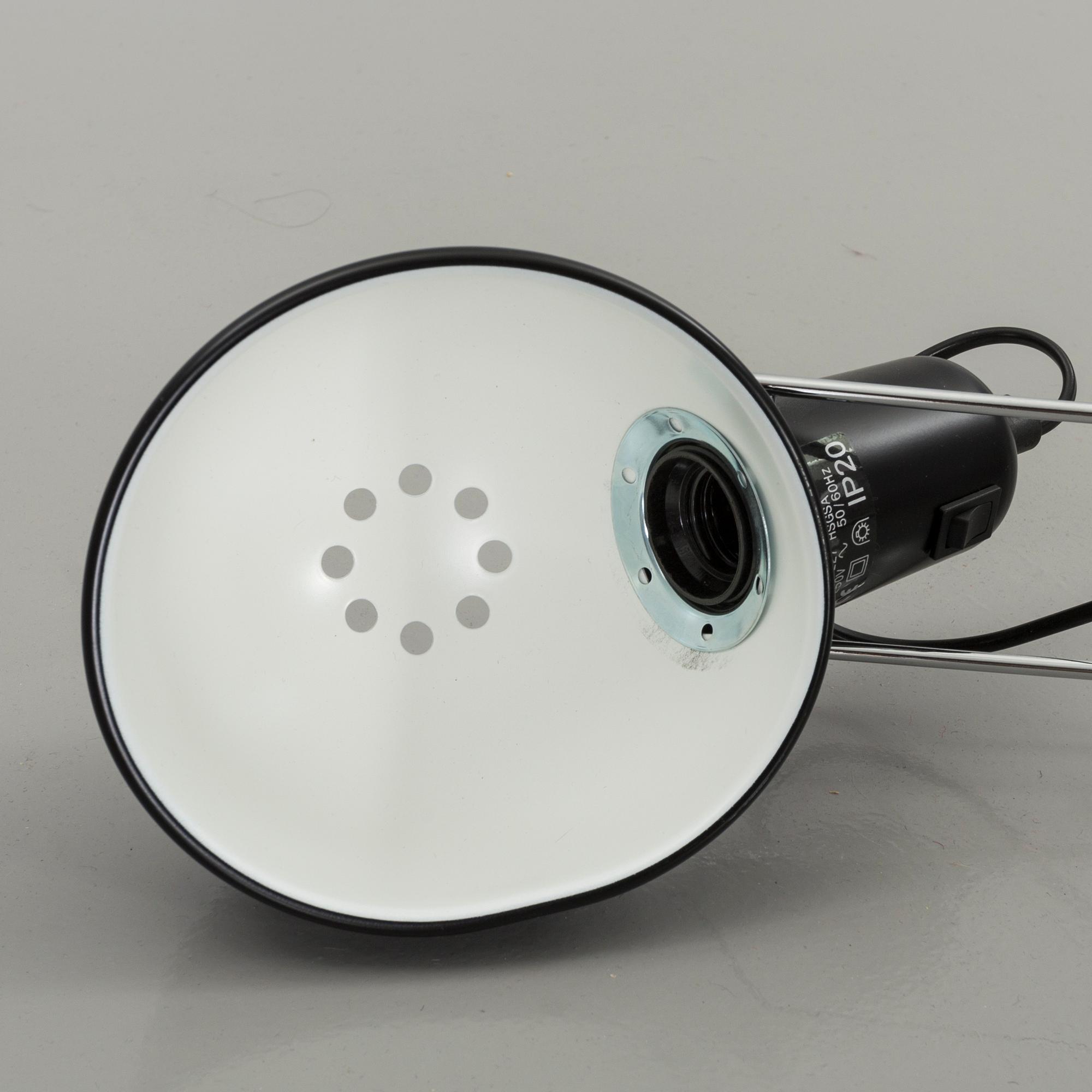 A FLOS WALL LAMP, MODEL 265. Designed by Paolo Rizzatto.