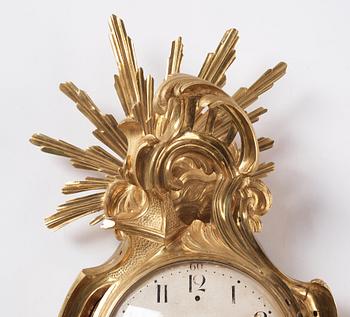 A Swedish Rococo gilt bronze wall clock, second part of the 18th century.