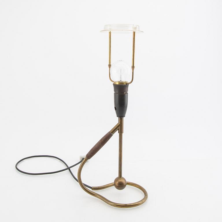 A "306" table lamp by Kaare Klint, mid 20th century.