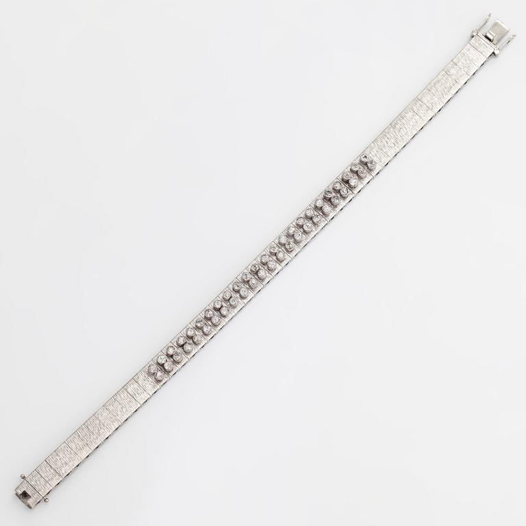 An 18K white gold bracelet, with round brilliant-cut diamonds totalling approximately 1.44 ct. Swedish import stamp.