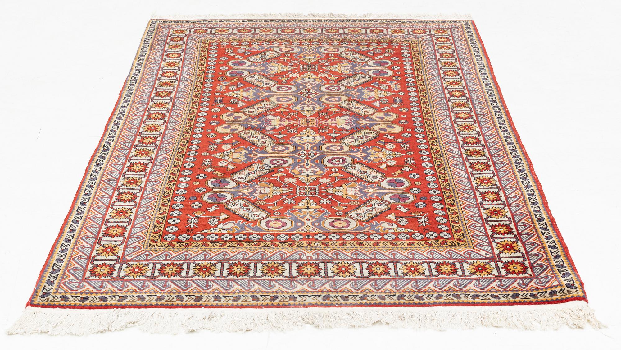 A rug, 215 x 130 cm.