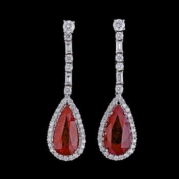 286. A pair of drop cut ruby, tot. 7.45 cts, and brilliant cut diamond earrings, tot. app. 1.33 cts.