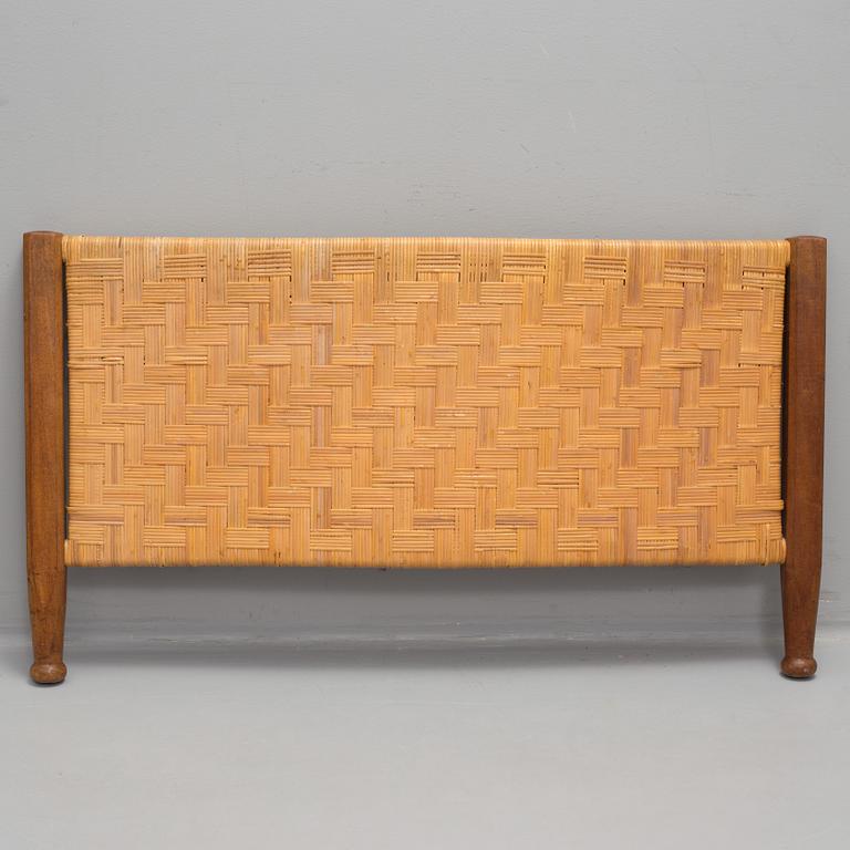 JOSEF FRANK, a model 520 mahogany and rattan bed from Svenskt Tenn.