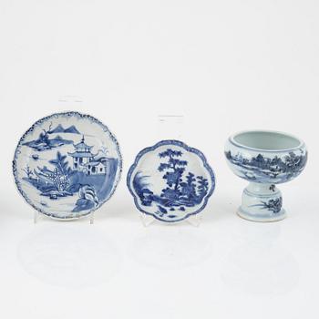 A blue and white stemcup and two dishes, Qing dynasty, 18th Century.