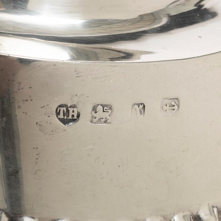 Thomas Hayes, a silver teapot, cream jug and sugar bowl, Birmingham 1897.