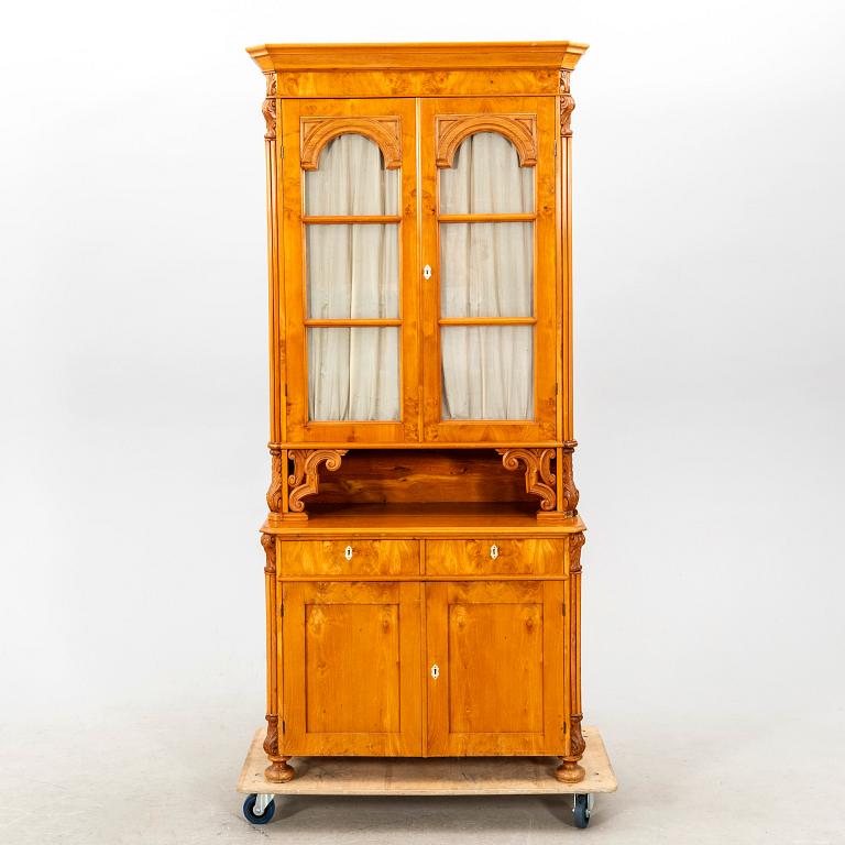 A Neo Rococo elm mid 1800s display cabinet.