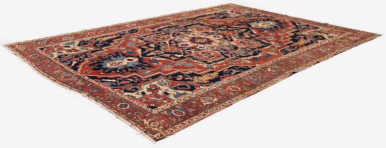 An antique Heriz carpet, Northwest Persia (Iran), c. 397 x 300 cm.