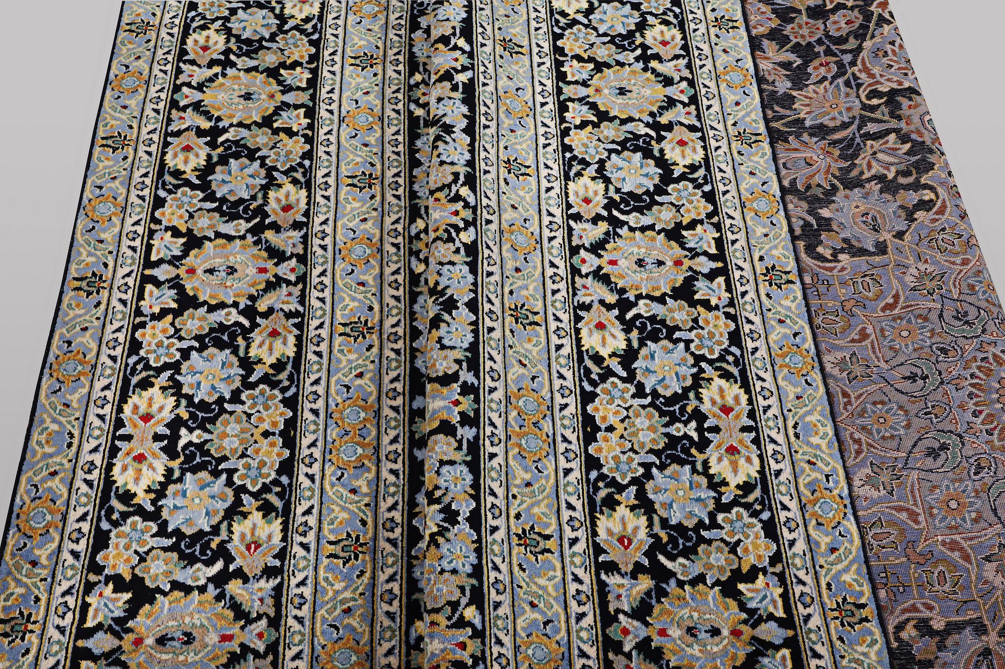 A carpet, Kashan, ca 405 x 295 cm.