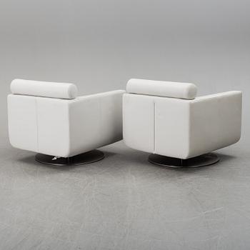 A pair of easy chairs from Natuzzi, Italy, 21th century.