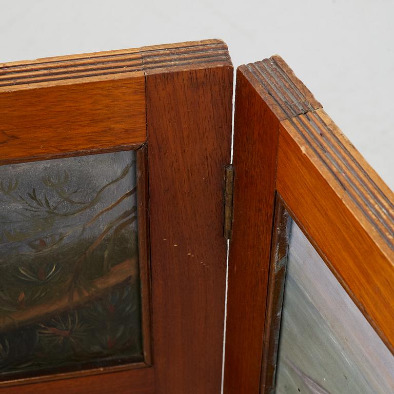 A folding screen, late 19th century.