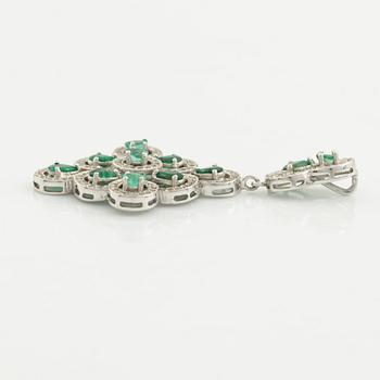 Earrings, a pair, and a pendant in white gold with emeralds and brilliant-cut diamonds.