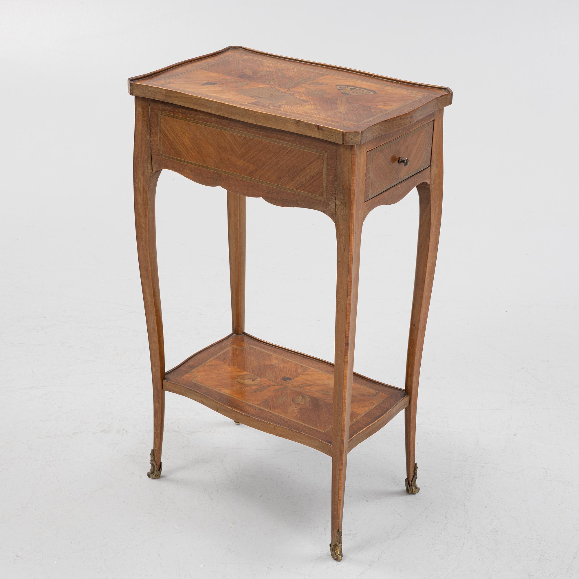 A Louis XV-style Table, circa 1900.