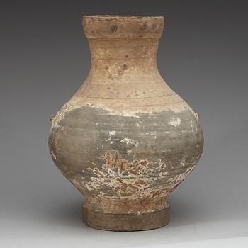 A unglazed jar, Han dynasty, (206 BC - 220 AD).