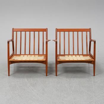 A pair of late 20th Century easy chairs.