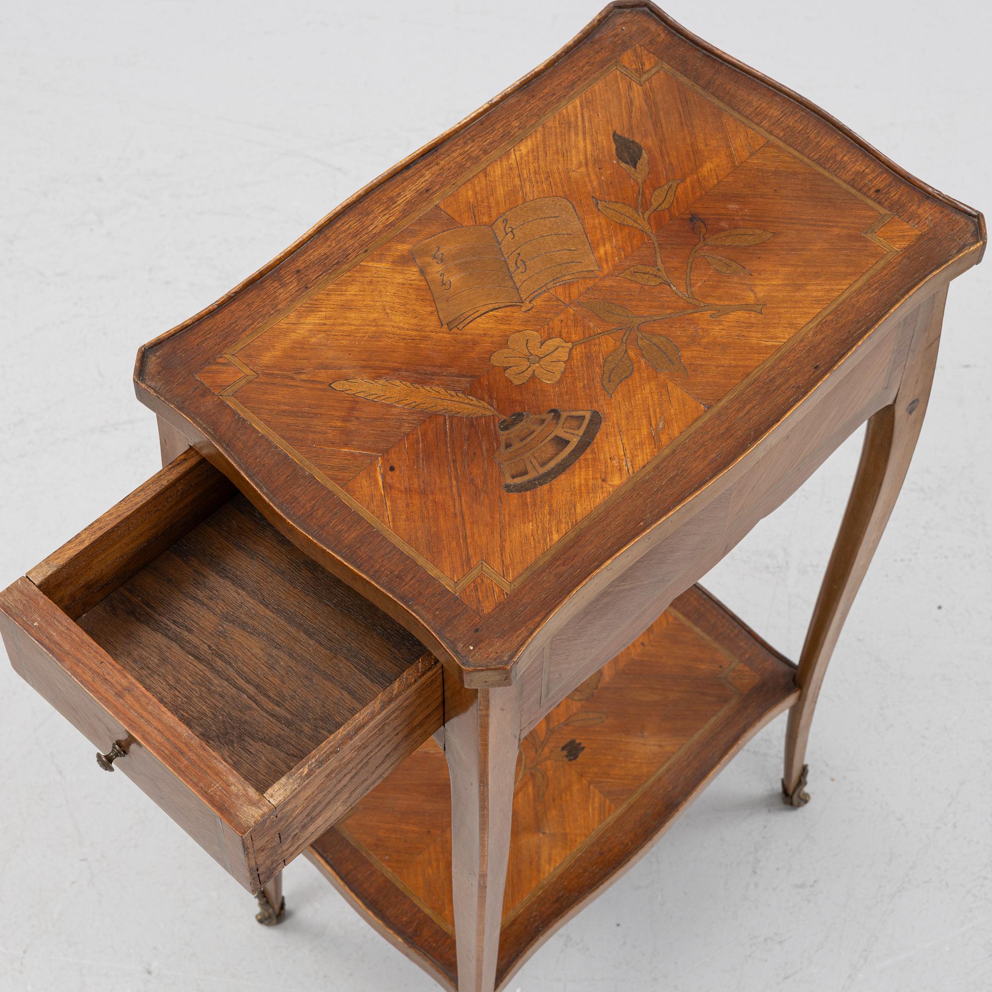 A Louis XV-style Table, circa 1900.